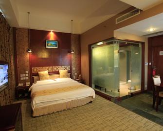 Kunming Golden Spring Hotel - קונמינג - חדר שינה