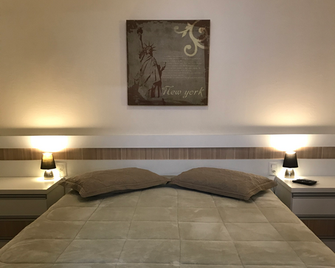 Wall Street Flat Service - Caxias do Sul - Quarto