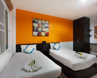 Sugar Ray's Hotel - Phuket - Schlafzimmer
