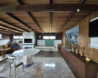 Pousada do Primo - Capão da Canoa - Sala de estar