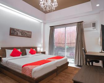 OYO 579 Anisabel Suites - Davao City - Bedroom