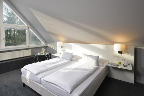 Relexa Waldhotel Schatten - Stuttgart - Bedroom