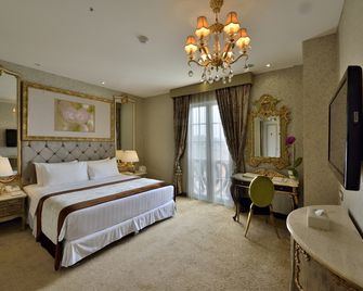 Amaroossa Royal Hotel Bogor - בוגור - חדר שינה