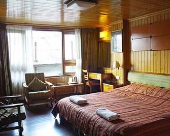 Dekeling Hotel - Darjeeling - Ložnice