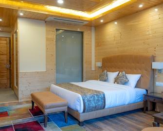 The Holiday Villa Resorts & Spa - Manali - Bedroom