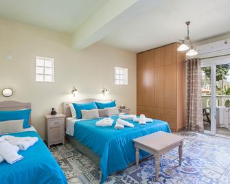 Stafylos Suites Boutique Hotel - Stafylos - Habitación