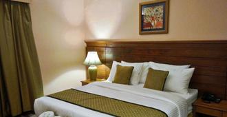 Capital O 10953 Dayal Lodge - A Boutique Hotel - Agra - Sypialnia
