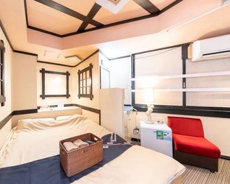 Tabist Hotel Florida Ikebukuro - Tokyo - Bedroom