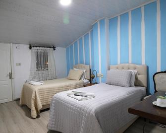 Serenity Stone House - Uchisar - Schlafzimmer