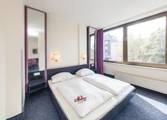 Hotel Mirage - Neuss - Κρεβατοκάμαρα