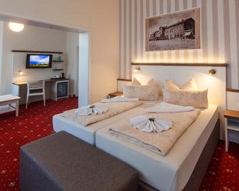 Hotel Weisse Düne - בורקום - חדר שינה