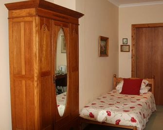 Lupus Den Country House B&B - Sunland - غرفة نوم