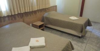 HF Minas Hotel - Vespasiano - Camera da letto