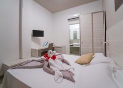 Villaggio Baia D'Ercole - Ricadi - Habitación