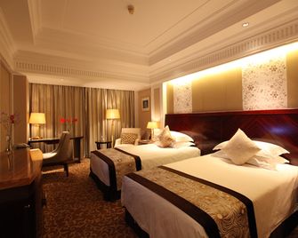 Shaoxing International Hotel - שאושינג - חדר שינה