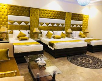 Rose Palace Hotel - Lahore - Bedroom