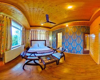Hotel Signature - Gulmarg - Спальня