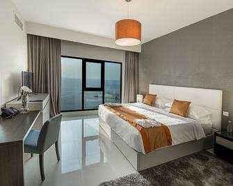 Lagoona Beach Luxury Resort and Spa - Budaiya - Bedroom