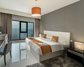 Lagoona Beach Luxury Resort and Spa - Budaiya - Schlafzimmer