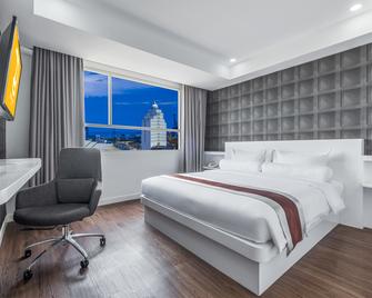 Royal Bay Hotel Makassar - ماكاسار - غرفة نوم