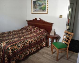 Empress Hotel - نيو اورليانز - غرفة نوم