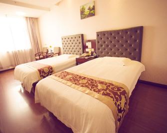 GreenTree Inn Shanxi Yan an Luochuan Fuqian Street Express Hotel - Yan’an - Slaapkamer