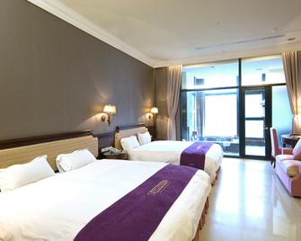 沐恩國際溫泉渡假飯店 - 礁溪鄉 - 臥室