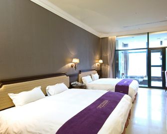 Muen Hot Spring Hotel - Jiaoxi - Slaapkamer