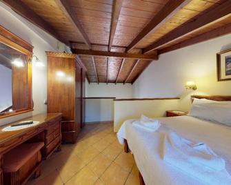 Magda's Hotel Apartments - Parga - Schlafzimmer