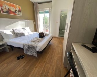 Hotel Christian Ideale Per Famiglie - Річчоне - Спальня