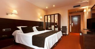 Hotel San Juan de los Reyes - Toledo - Schlafzimmer