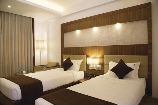 Urvashi Residency - Chennai - Phòng ngủ