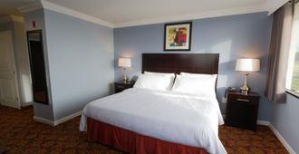 Amco Hotel And Suites Austin - Austin - Bedroom