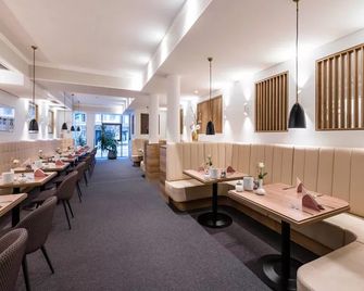 Boutique Hotel Zach - אינזברוק - חדר אוכל