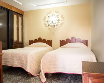 Hotel Flamingos De Ciudad Guzman - Ciudad Guzmán - Habitación