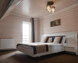 Hotel Bellavista & Spa - Bukovel - Yatak Odası