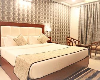 Hotel Varanasi Inn - Benarés - Habitación