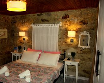 Imerek Stone House Hotel - Τσεσμέ - Κρεβατοκάμαρα