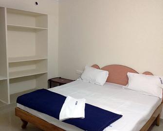 Srinidhi Residency - Bhadrāchalam - Bedroom