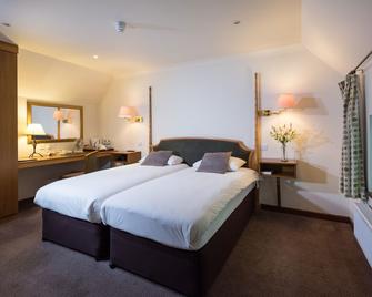 Golden Lion Hotel - Rugby - Schlafzimmer